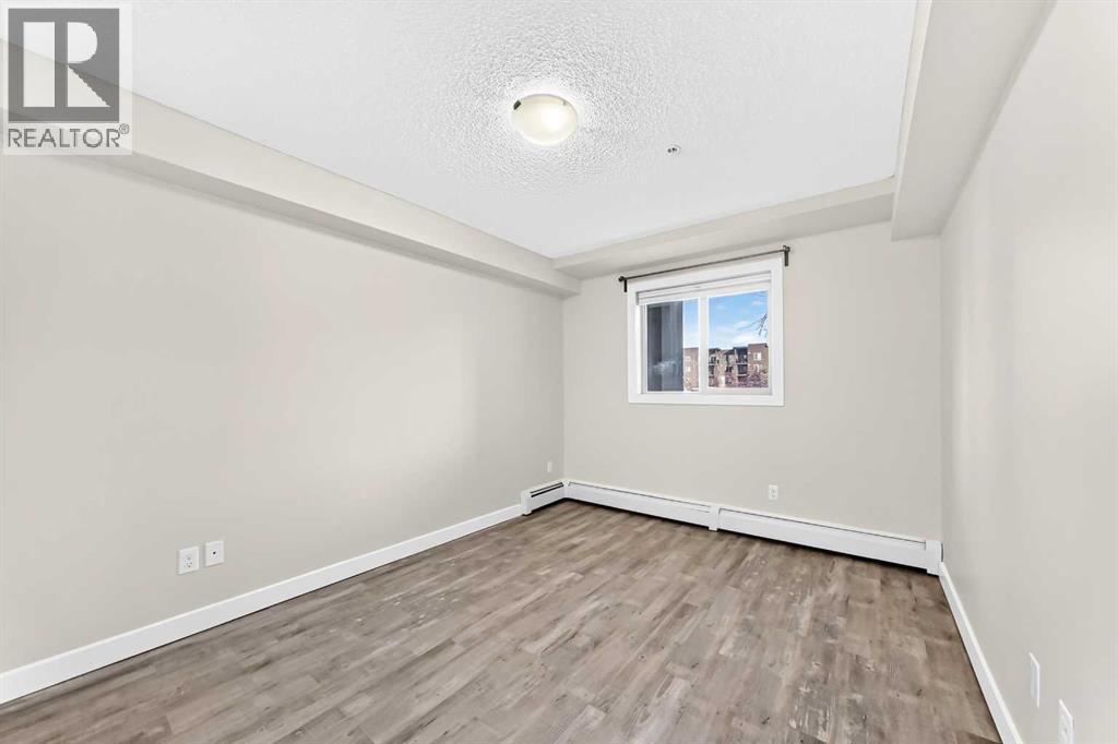 4118, 403 Mackenzie Way SW, Airdrie — photo 30