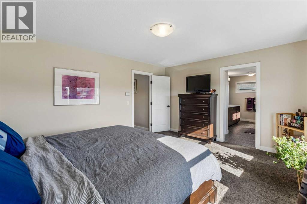 281 Boulder Creek Crescent SE, Langdon — photo 24