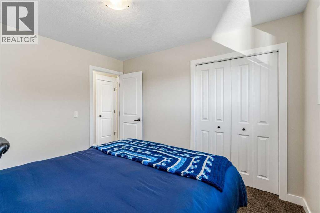 281 Boulder Creek Crescent SE, Langdon — photo 21