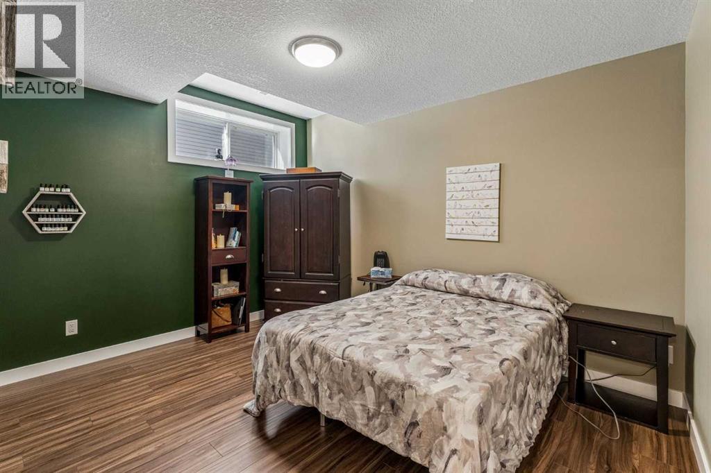 281 Boulder Creek Crescent SE, Langdon — photo 32