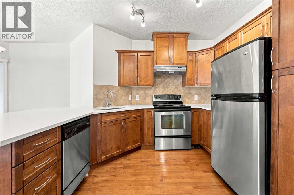 305, 30 Discovery Ridge Close SW photo 12