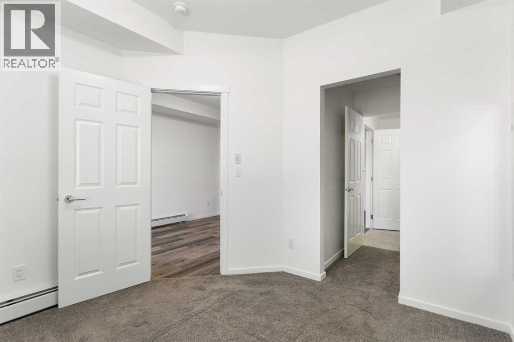 1206, 298 Sage Meadows Park NW photo 22