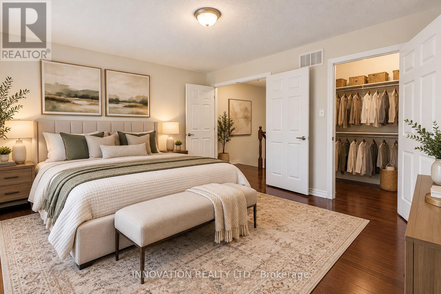 primary bedroom with ensuite and walk in closet
