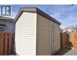Family room - 412 Abadan Place Ne, Calgary, AB T2A6W3 Photo 7