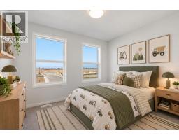 Bedroom - 90 Rosemary Gardens Se, Calgary, AB T3S1B2 Photo 9