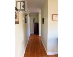 Hallway to bedrooms and bath