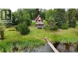 Front exterior of 24845 CHIEF LAKE ROAD · Prince George, BC
