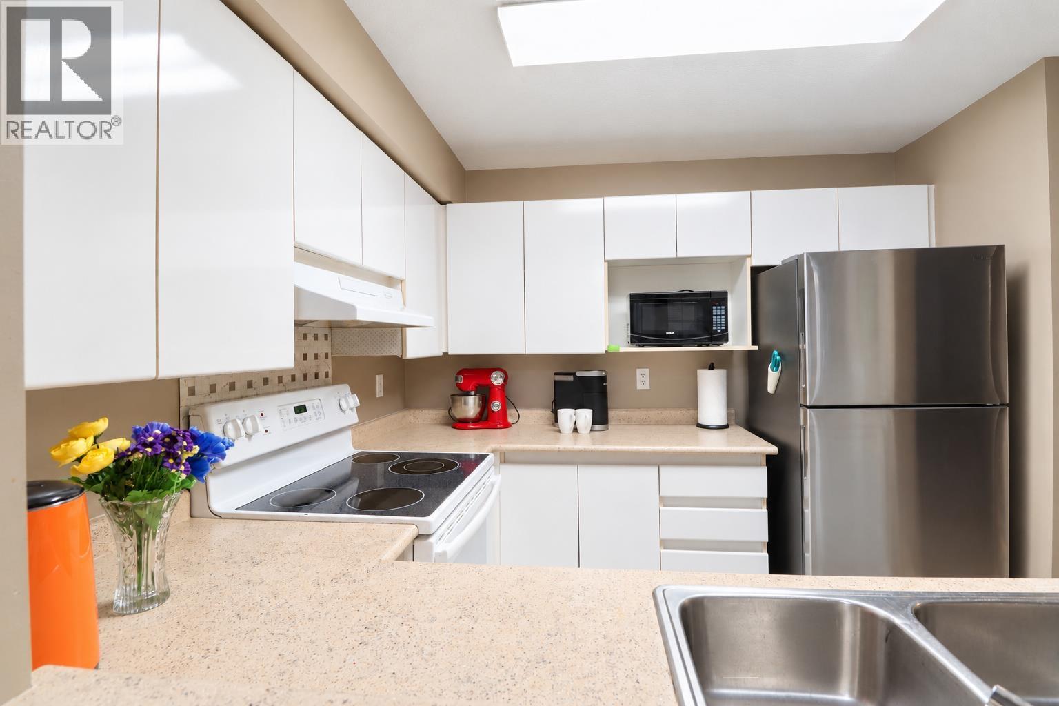 206 1199 WESTWOOD STREET, Coquitlam - Image 1