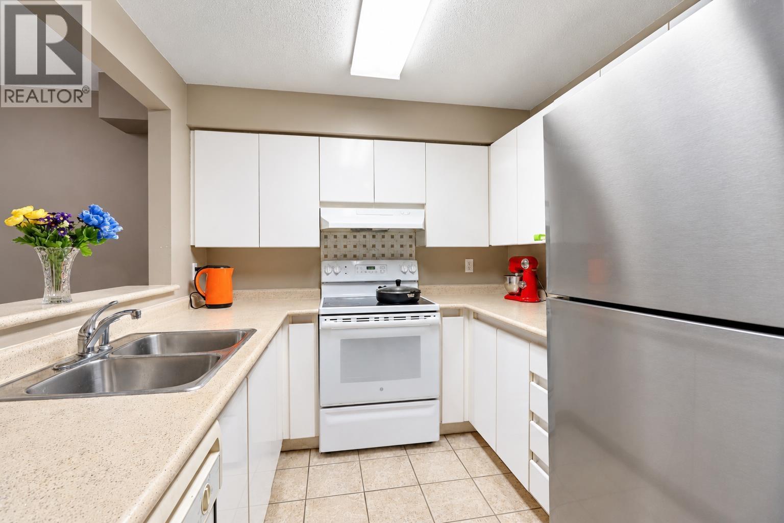 206 1199 WESTWOOD STREET, Coquitlam - Image 1