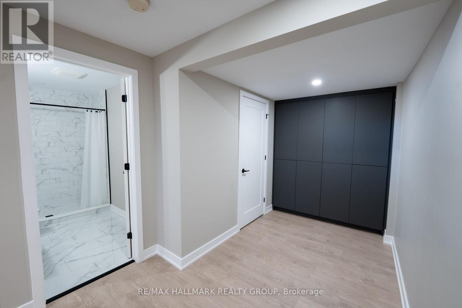 Basement Built-In Cabinets and 3-Piece Bathroom