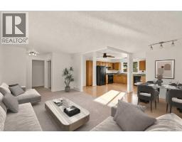 Living room - 19 Maryvale Crescent Ne, Calgary, AB T2A2V5 Photo 7
