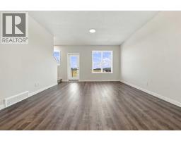 Primary Bedroom - 1005, 132 Red Embers Link Ne, Calgary, AB T3N2X8 Photo 8