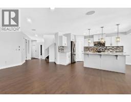 Family room - 98 Panamount Villas Nw, Calgary, AB T3K0A4 Photo 13