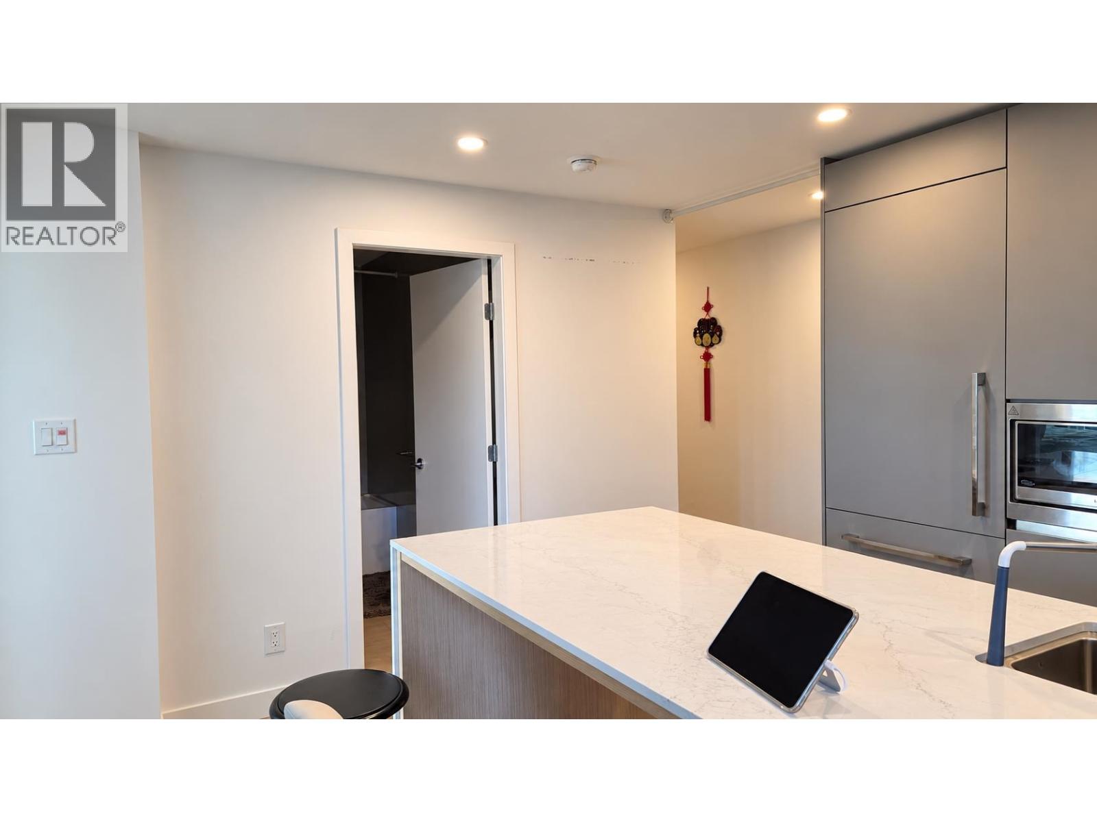 Photo of 301 7977 LANSDOWNE ROAD 10