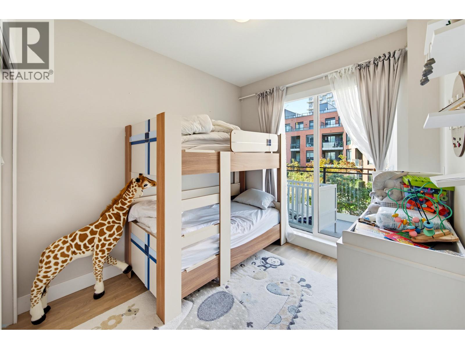 Photo of 310 3588 SAMWILL CRESCENT 18