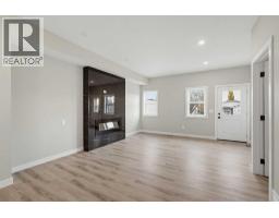 Living room - 4353 61st Ave Innisfail, Innisfail, AB T4G0P3 Photo 9