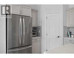Laundry room - 213 Vista Drive, Crossfield, AB T0M0S0 Photo 10