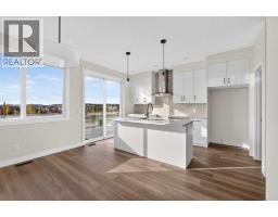 Laundry room - 165 Silver Spruce Road Sw, Calgary, AB T2X6L3 Photo 10