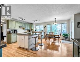 Family room - 12817 Douglasview Boulevard Se, Calgary, AB T2Z2N3 Photo 7