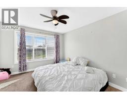 Family room - 4, 69 Aquitania Circle W, Lethbridge, AB T1J5M5 Photo 14