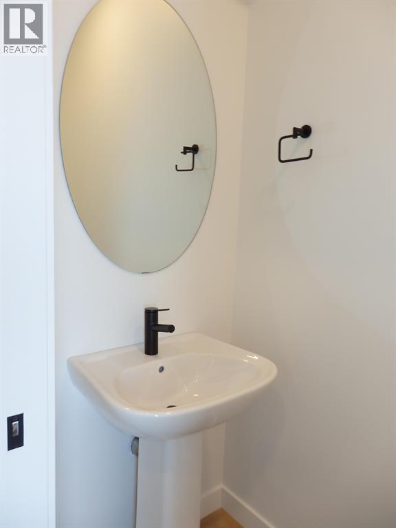 1/2 bath @ back entry