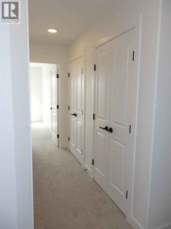 double linen closets in hallway