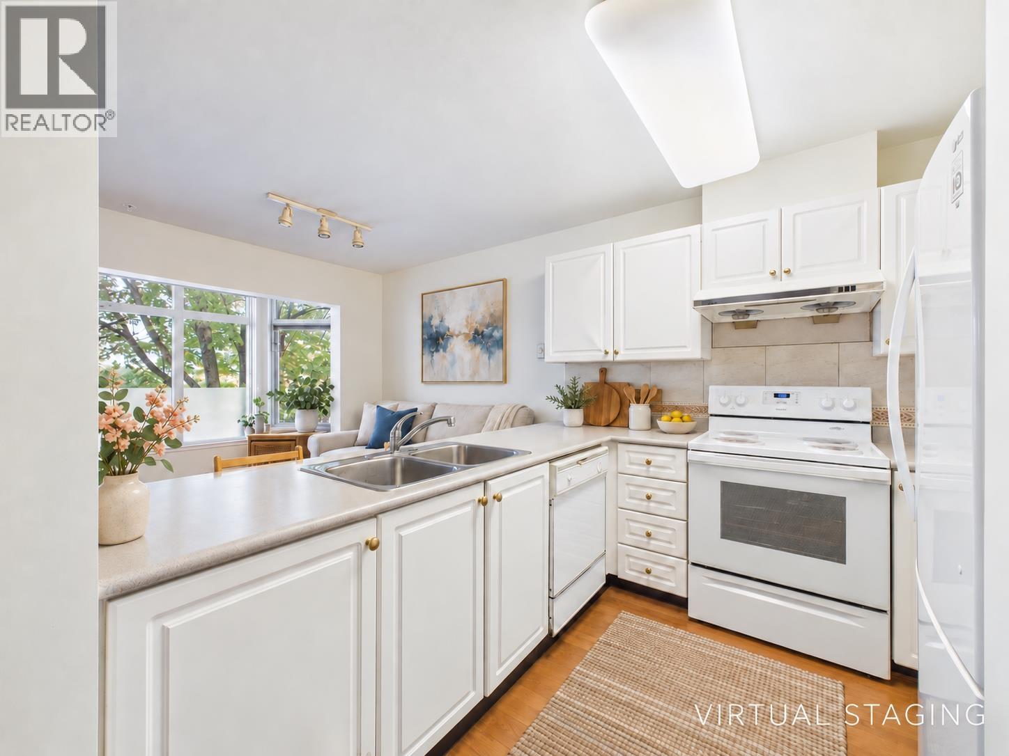 Photo of 208 2677 E BROADWAY STREET 17