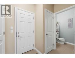 Family room - 14 Riviera Place, Cochrane, AB T4C0V4 Photo 9