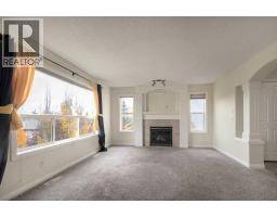 Living room - 151 Bow Ridge Crescent, Cochrane, AB T4C1V2 Photo 6