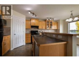 4pc Bathroom - 151 Bow Ridge Crescent, Cochrane, AB T4C1V2 Photo 9