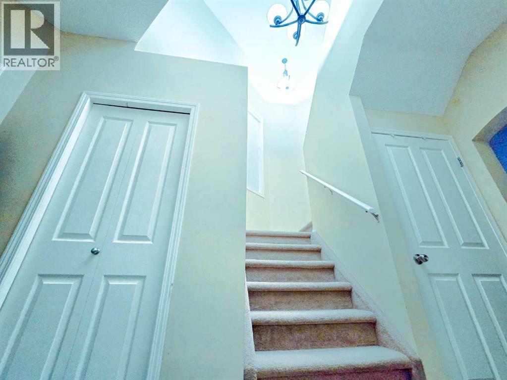 13 Tuscany Ridge Mews NW, Calgary — photo 6