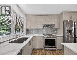 Laundry room - 1415 Lake Ontario Drive Se, Calgary, AB T2J4Y3 Photo 13