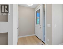 Laundry room - 235 Waterford Heights, Chestermere, AB T1X3B7 Photo 9