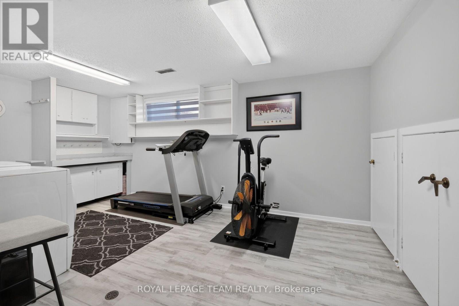 Spacious Utility area can accommodate gym area.