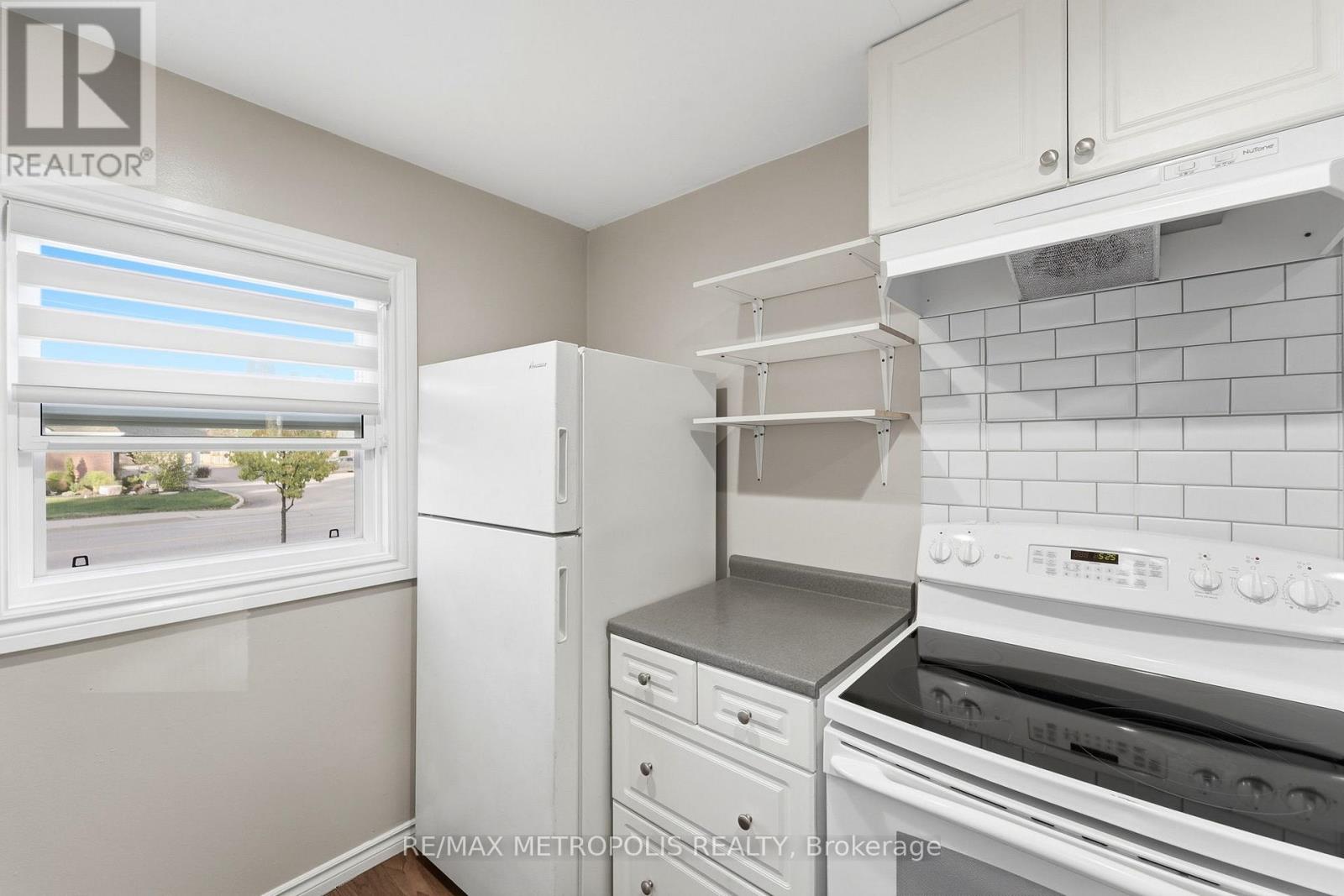 MAIN FL - 56 CHARING CROSS STREET, Brantford — photo 12