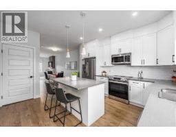 Bedroom - 228 River Heights Drive, Cochrane, AB T4C0W2 Photo 11
