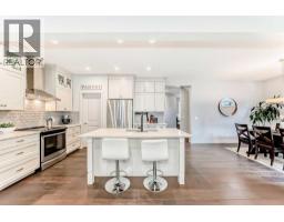 Kitchen - 743 Shawnee Drive Sw, Calgary, AB T2Y1V6 Photo 11
