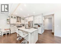 Laundry room - 743 Shawnee Drive Sw, Calgary, AB T2Y1V6 Photo 6
