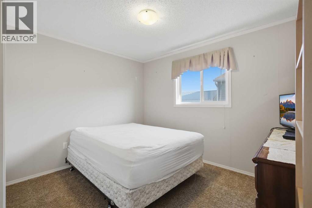 98, 15 Mackenzie Ranch Way, Lacombe — photo 14