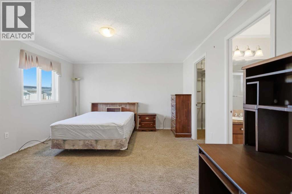 98, 15 Mackenzie Ranch Way, Lacombe — photo 20