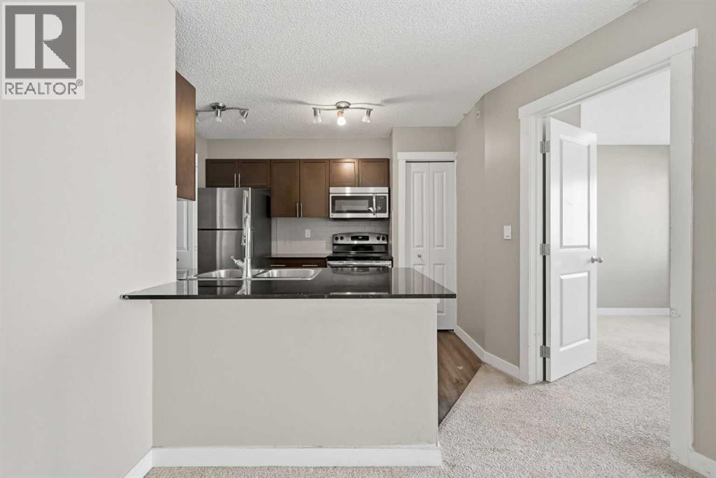 504, 10 Kincora Glen Park NW photo 15