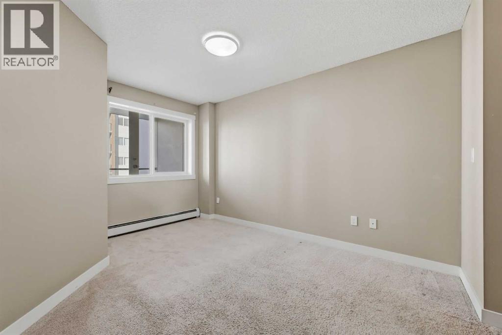 504, 10 Kincora Glen Park NW photo 21