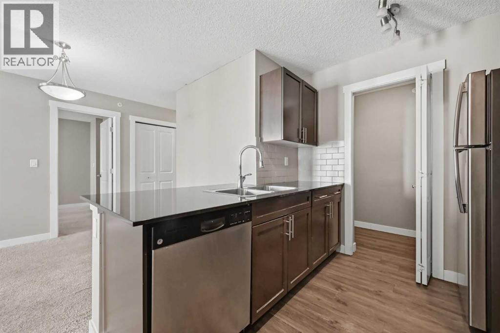 504, 10 Kincora Glen Park NW photo 17