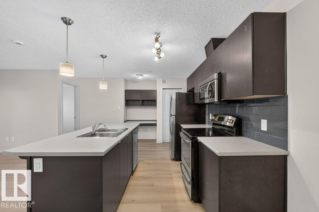 #103 508 ALBANY WY NW, Edmonton — photo 2