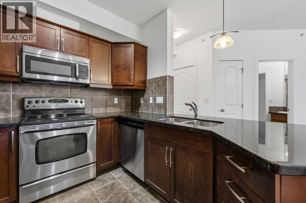 313, 15304 Bannister Road SE, Calgary — photo 11
