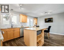 Family room - 71 Strathclair Rise Sw, Calgary, AB T3H1G3 Photo 11