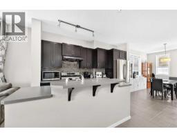 Bedroom - 1701, 125 Panatella Way Nw, Calgary, AB T3K0R9 Photo 11
