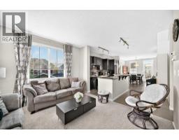 Living room - 1701, 125 Panatella Way Nw, Calgary, AB T3K0R9 Photo 8