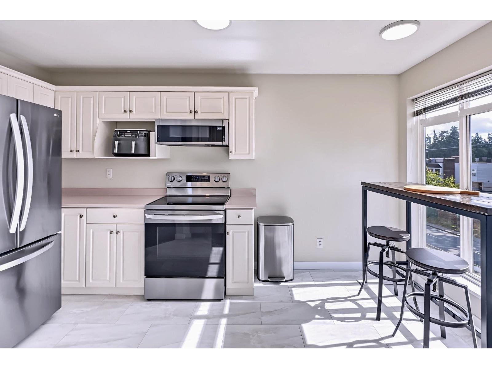 403 32075 GEORGE FERGUSON WAY, Abbotsford - Image 1