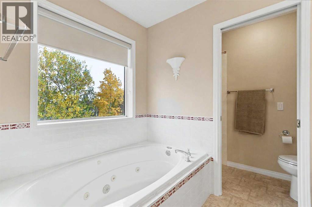 436 Rocky Ridge Bay NW, Calgary — photo 19